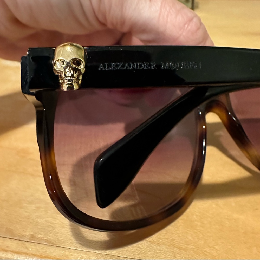 Alexander McQueen sunglasses.